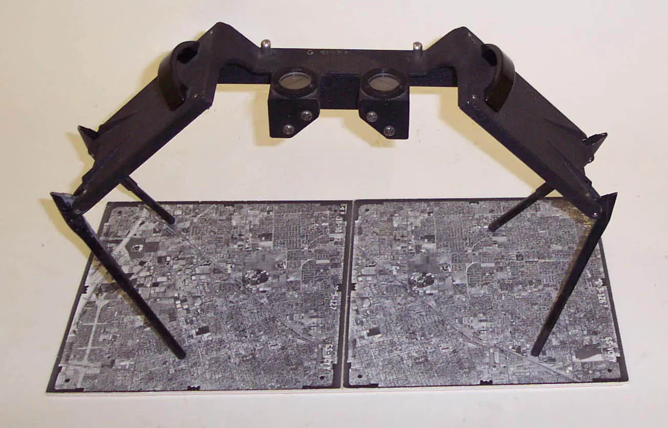 Stereoscope used for early aerial photogrammetry, allowing for 3D terrain analysis from overlapping vertical photographs. (USGS)